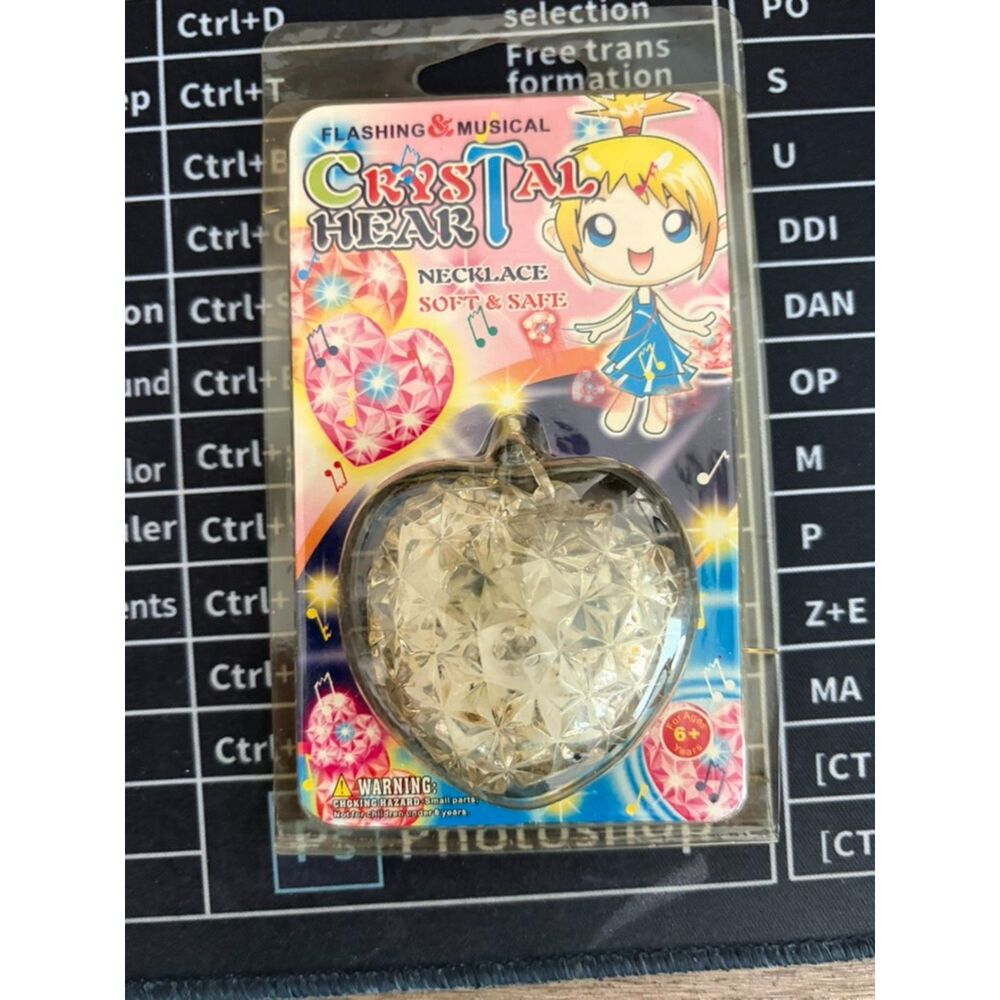 Vtg Crystal heart flashing and musical necklace toy NIP